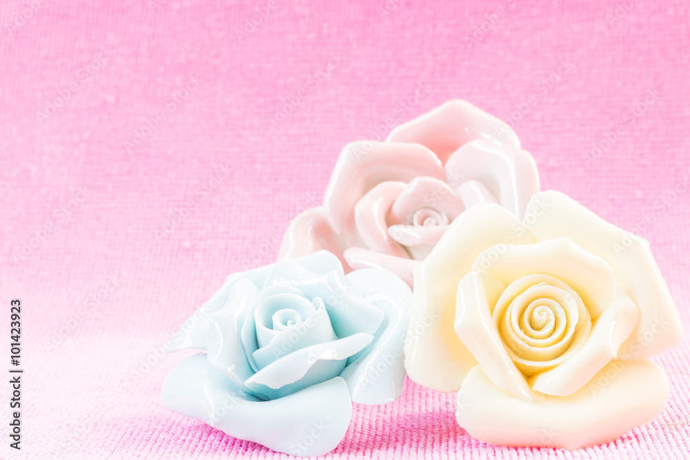 Pastel Rose (Ceramic ) on pink fabic background Pastel Rose (Ceramic ) on pink fabic background