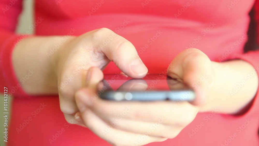 woman writes a message smartphone, close up woman writes a message smartphone, close up