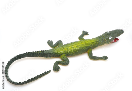 toy crocodile on a white background © enskanto