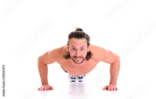 young man doing press-up