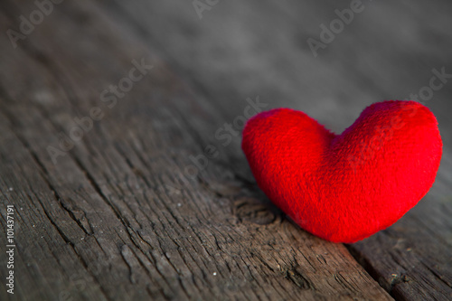 Valentines day red heart on old wooden background