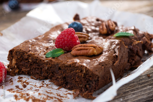 Brownies on wooden background
