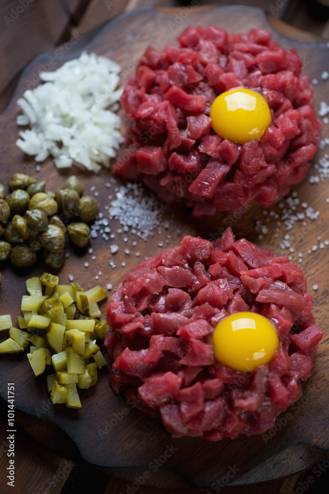 Close-up of beef steak tartare, selective focus, studio shot