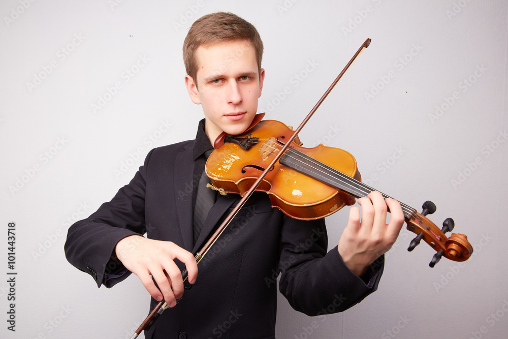 young man with a violin young man with a violin