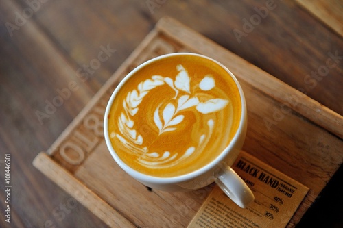  Coffee latte art on the wooden board