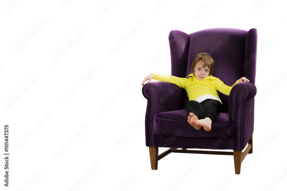 bored red hair boy sitting on the purple couch bored red hair boy sitting on the purple couch