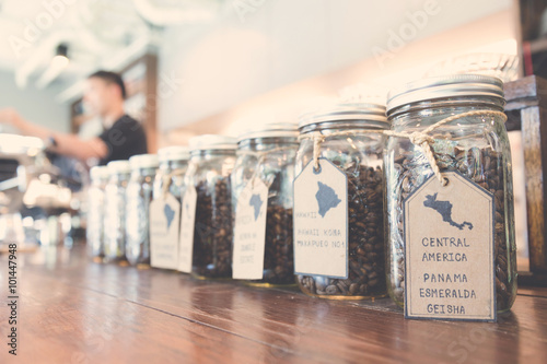 display of specialty coffee beans in coffee shop, vintage tone a