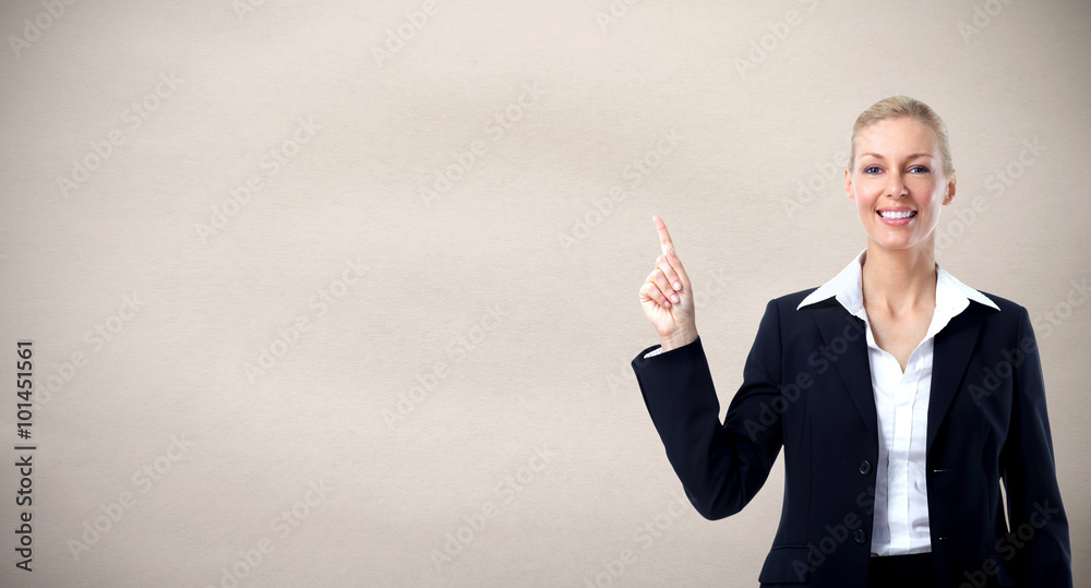 Beautiful business woman presenting copy space.