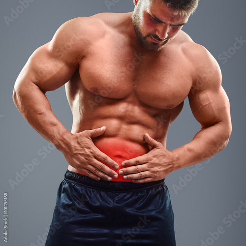Ahtletic muscle man Stomach ache © kegfire