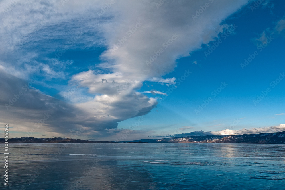 clouds over the ice of lake Baikal