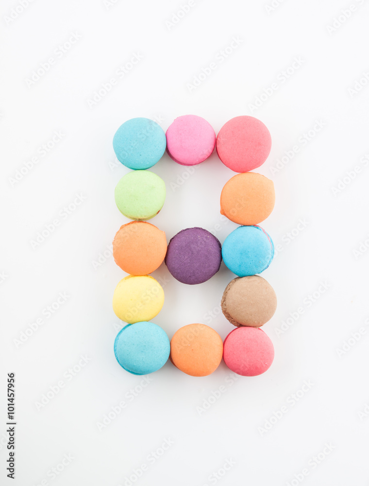 colorful macarons arrangment is number eight