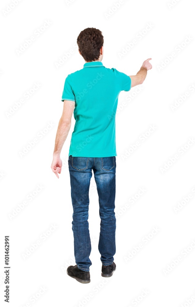 Back view of pointing young men in shirt and jeans. Back view of pointing young men in shirt and jeans.