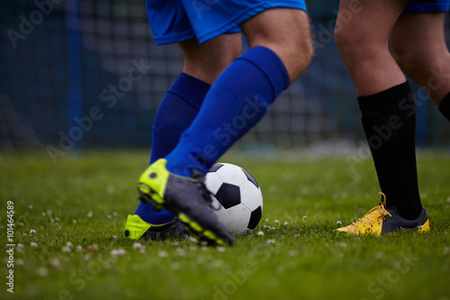 Fototapeta Naklejka Na Ścianę i Meble -  Soccer player legs in action 