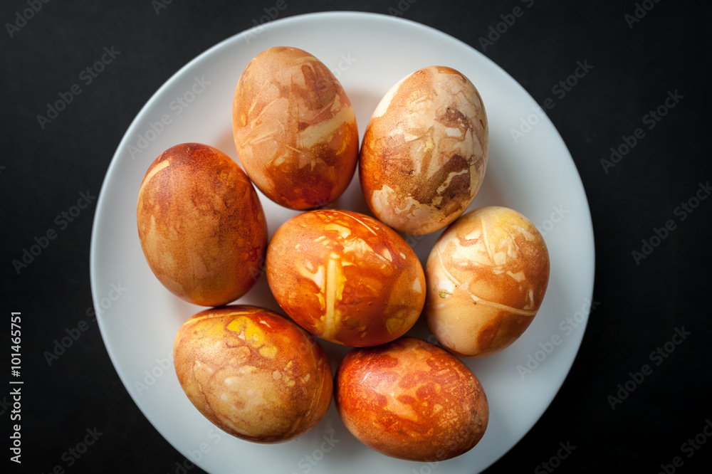 Bio and Natural way of painted eggs with fresh leaves and onion shells Bio and Natural way of painted eggs with fresh leaves and onion shells