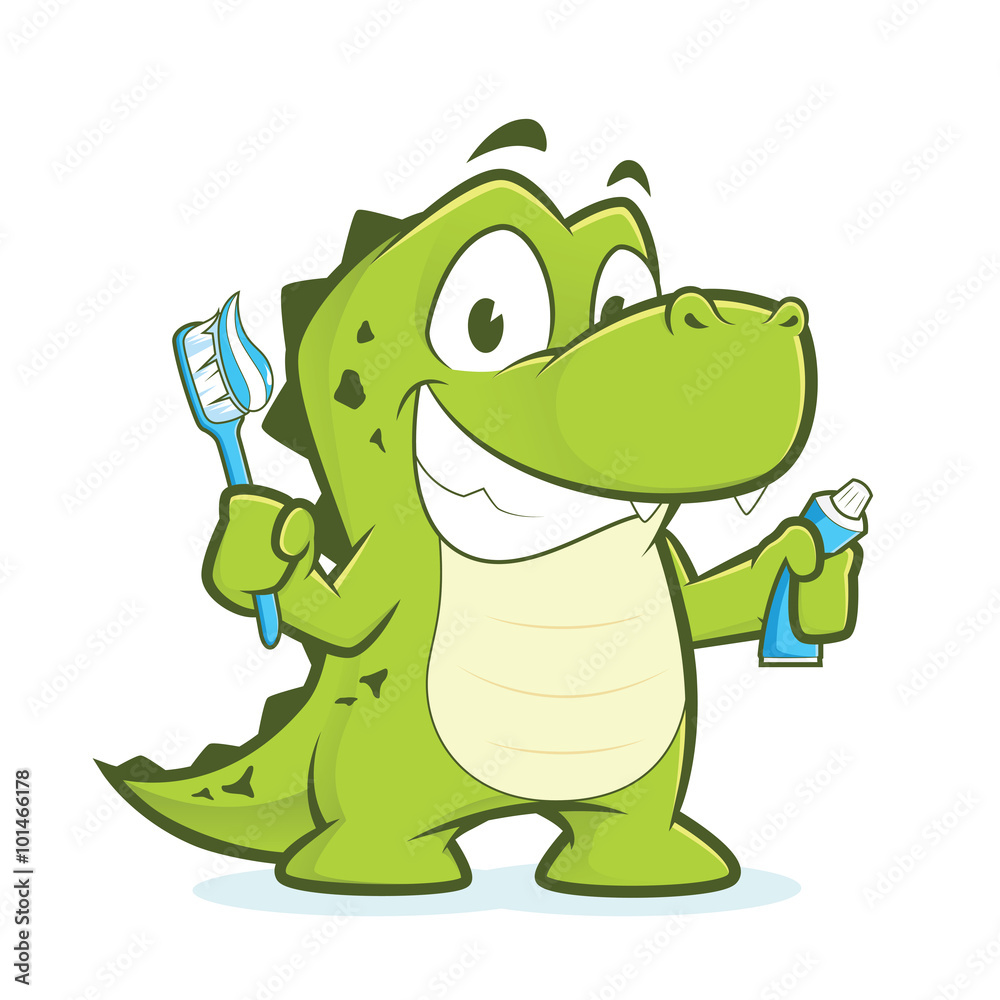 Fototapeta premium Crocodile or alligator holding toothbrush and toothpaste