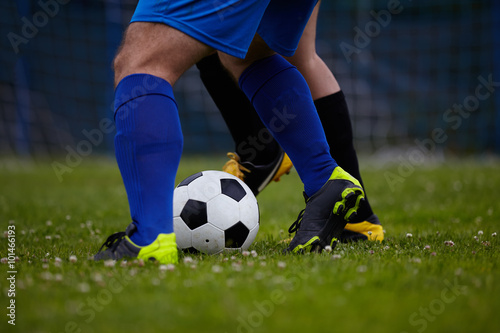 Fototapeta Naklejka Na Ścianę i Meble -  Soccer player legs in action 