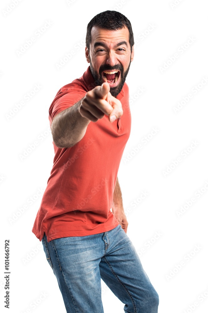 Handsome man pointing to the front Handsome man pointing to the front