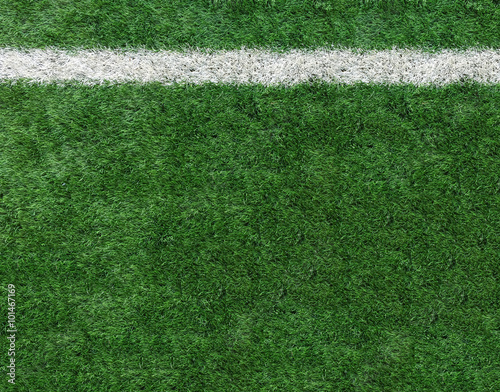 White Stripe Line at The Corner on Artificial Green Soccer Field as Copyspace to input Text from Top View used as Template