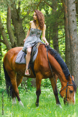 beautiful young girl on horse