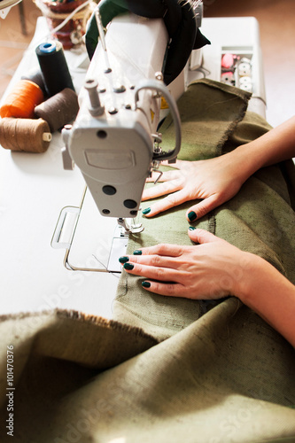 seamstress sews clothes