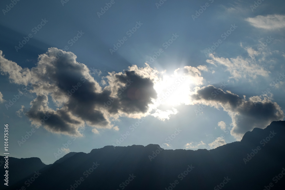 Blue sky with clouds and mountains peak Blue sky with clouds and mountains peak