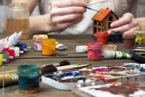 old paint brush and a jar of water