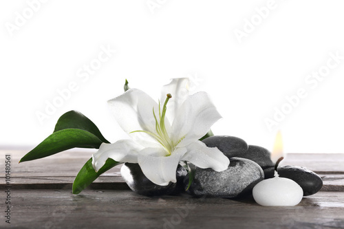 Fototapeta Naklejka Na Ścianę i Meble -  Spa still life with beautiful flower and candle isolated on white