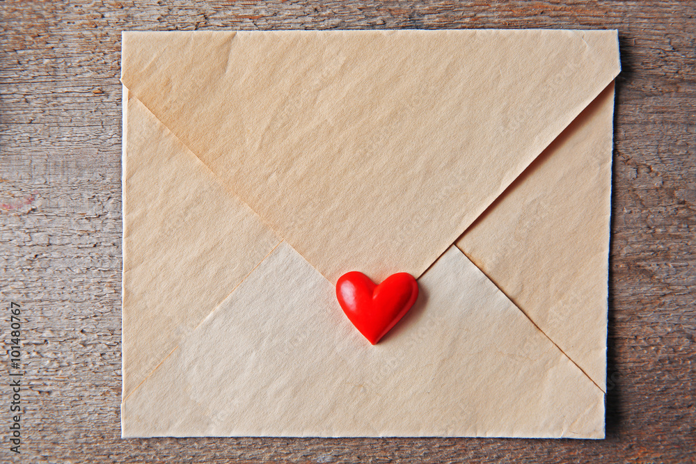 Blank present Valentine envelope on wooden background Blank present Valentine envelope on wooden background