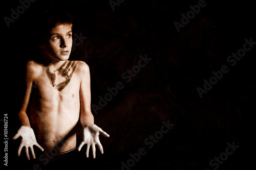 Clueless Shirtless Boy on Black with Copy Space