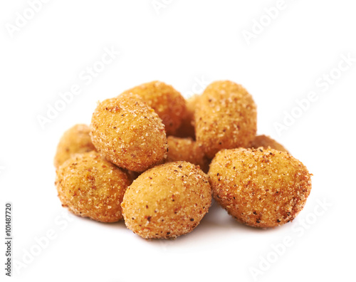 Pile of crunchy coated nuts isolated