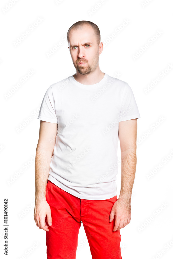 Disappointed handsome bald bearded man in white t-shirt isolated on white Disappointed handsome bald bearded man in white t-shirt isolated on white