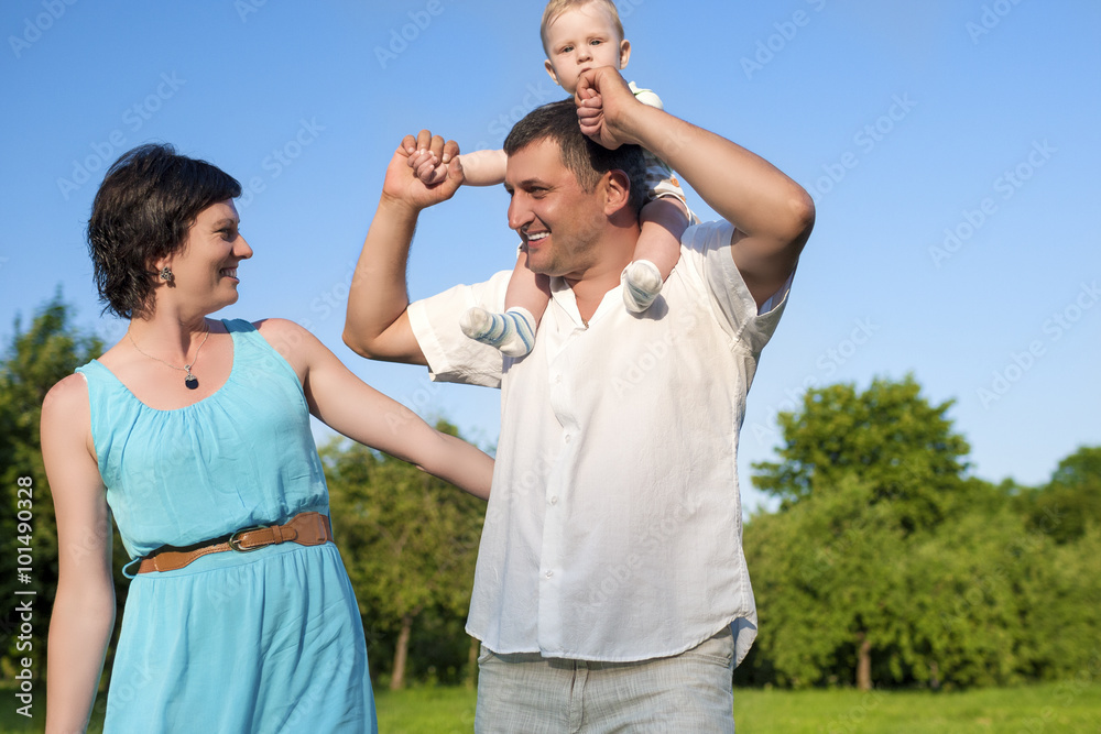 Relationships Concepts. Young Caucasian Family of Three People Relationships Concepts. Young Caucasian Family of Three People