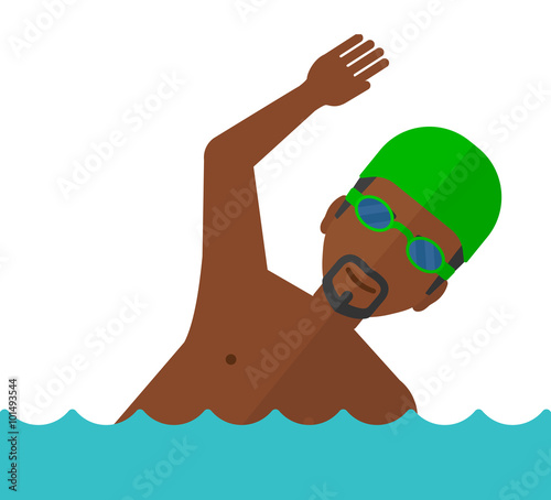 Swimmer training in pool.