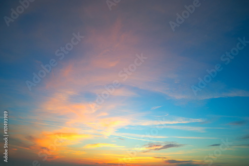 Beautiful yellow - orange sky at sunset in summer .