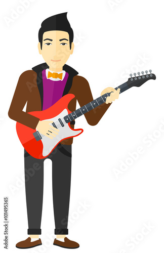 Musician playing electric guitar.