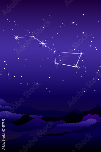 Ursa Major constellation or The Greater or larger she-bear with a group of seven relatively bright stars commonly known as the Big Dipper. Night sky and landscape with mountains and hills silhouette.