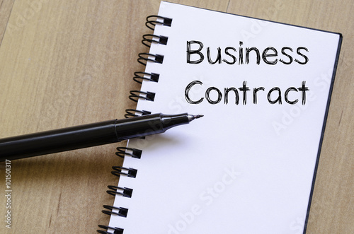 Business contract write on notebook