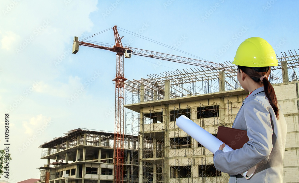 portrait women asia engineer working and holding blueprints at c portrait women asia engineer working and holding blueprints at c