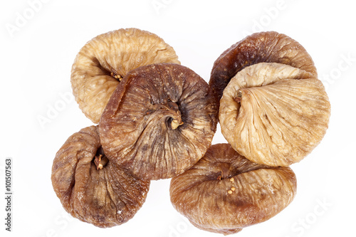 some fruits of dried fig isolated on white background