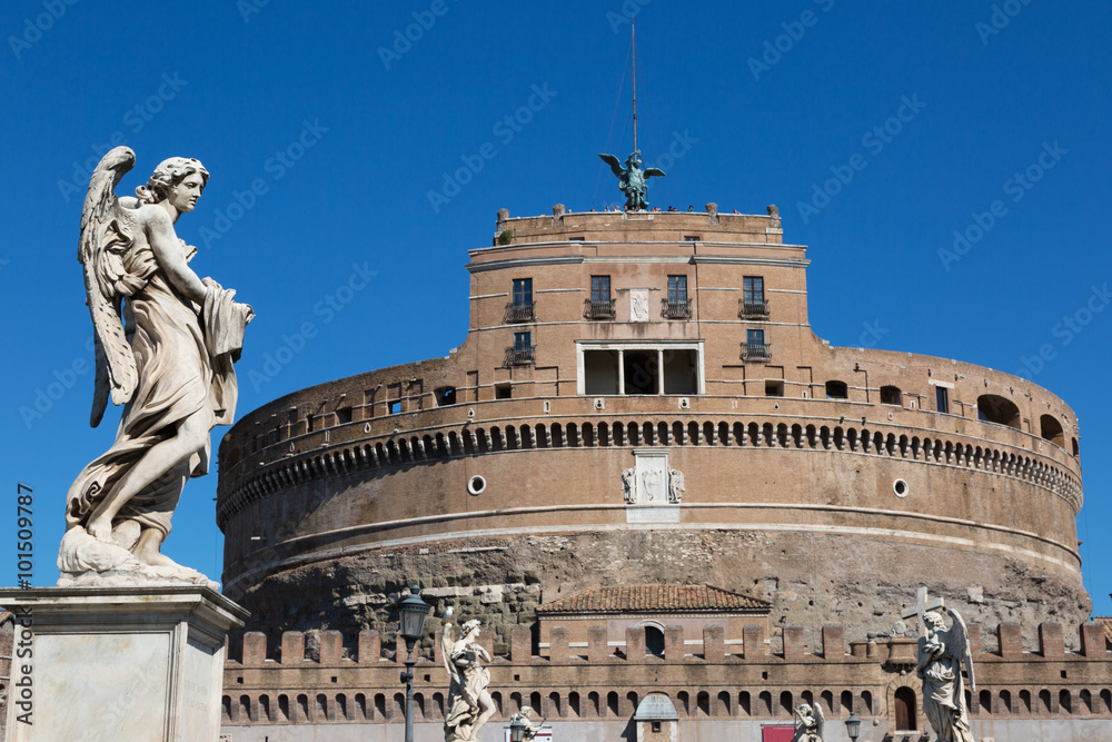 Angel statue on a bridge in front of the Castel Sant Angelo in Rome, Italy