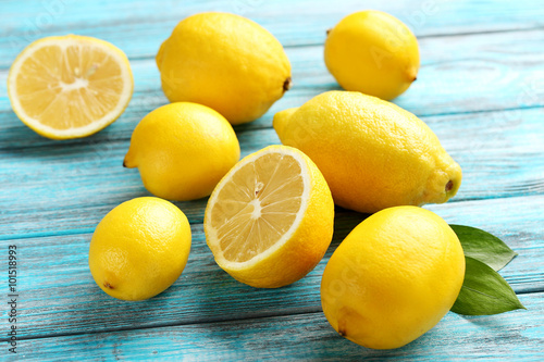 Lemon fruits on a blue wooden table