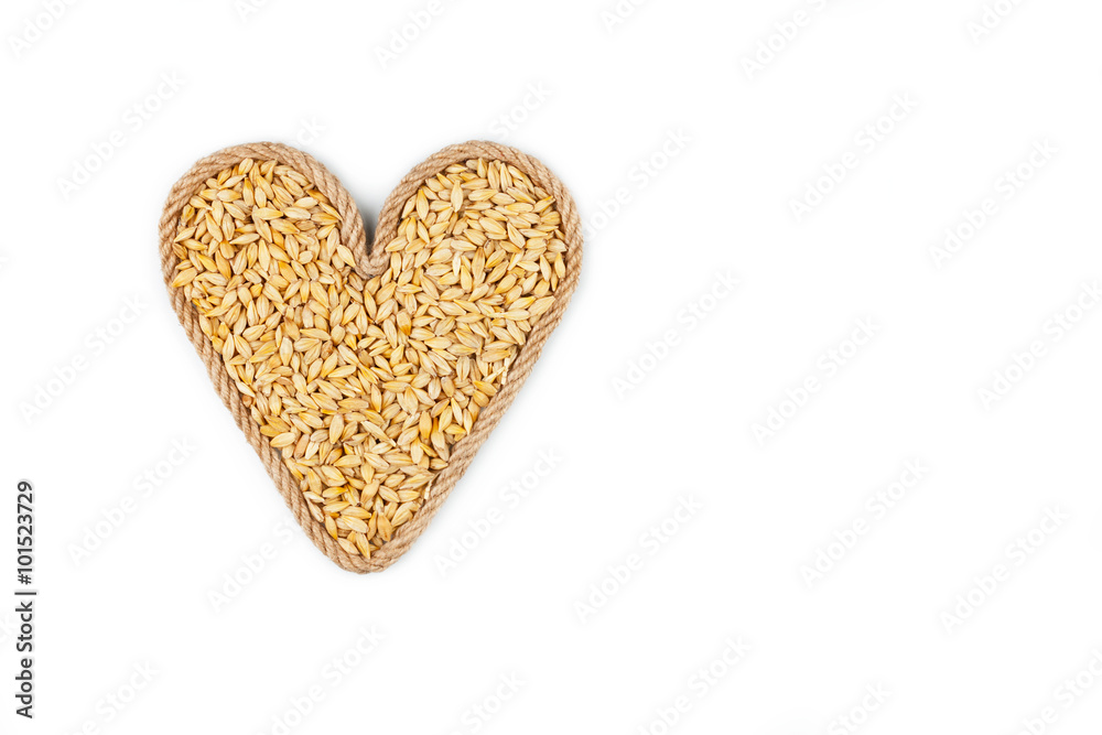 Symbolic heart made from rope with barley grains Symbolic heart made from rope with barley grains