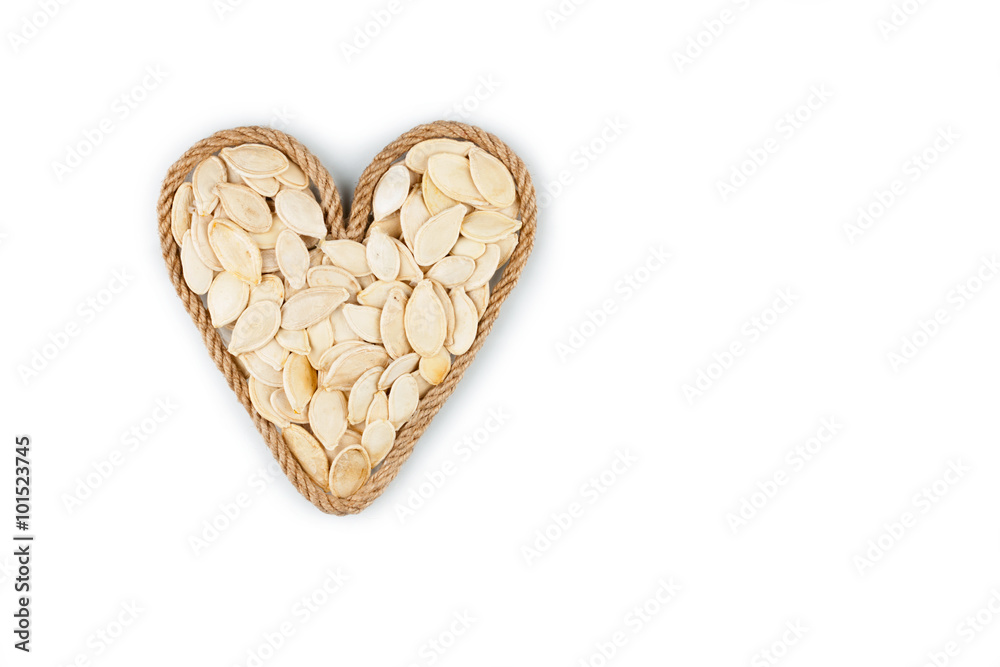 Symbolic heart made from rope with pumpkin seeds Symbolic heart made from rope with pumpkin seeds