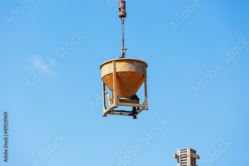 Crane working in construction on blue sky