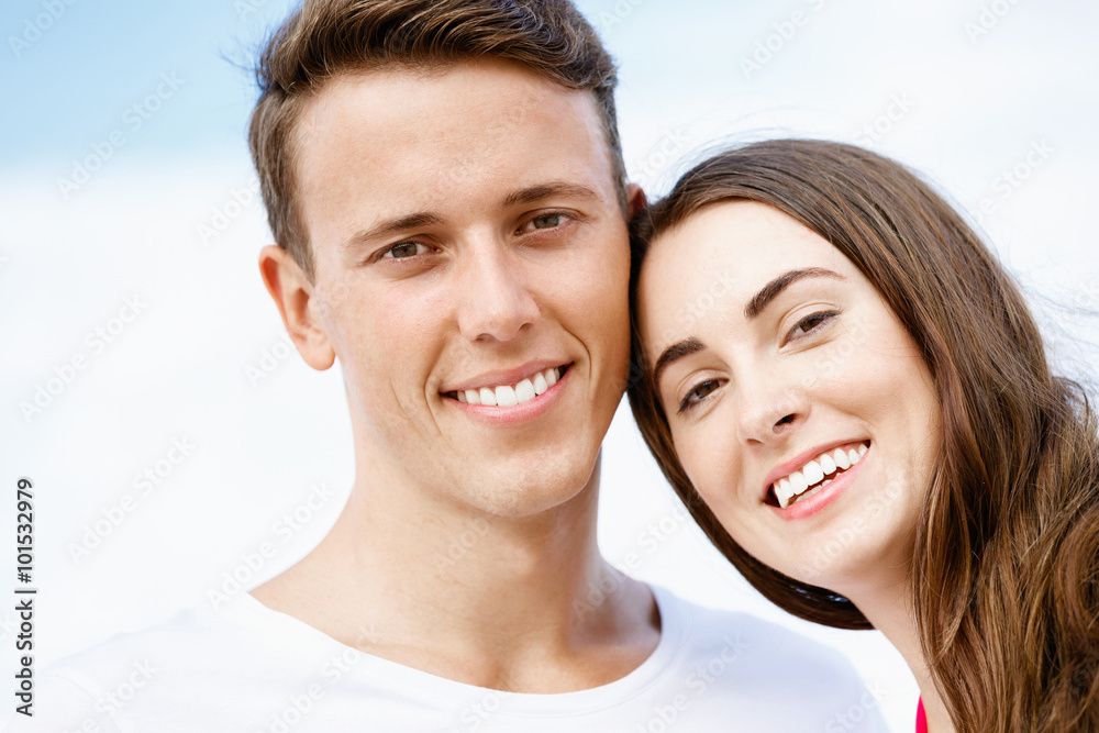 Romantic young couple on the beach