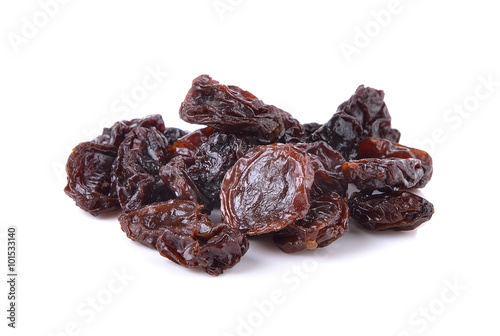 Dried raisins on a white background photo