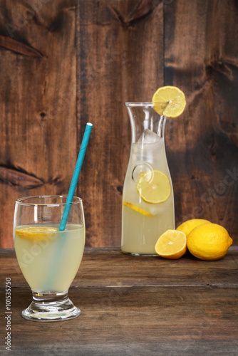 glass lemonade with blue straw