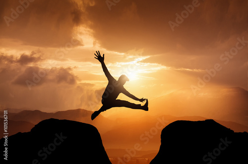 silhouette of man jumping