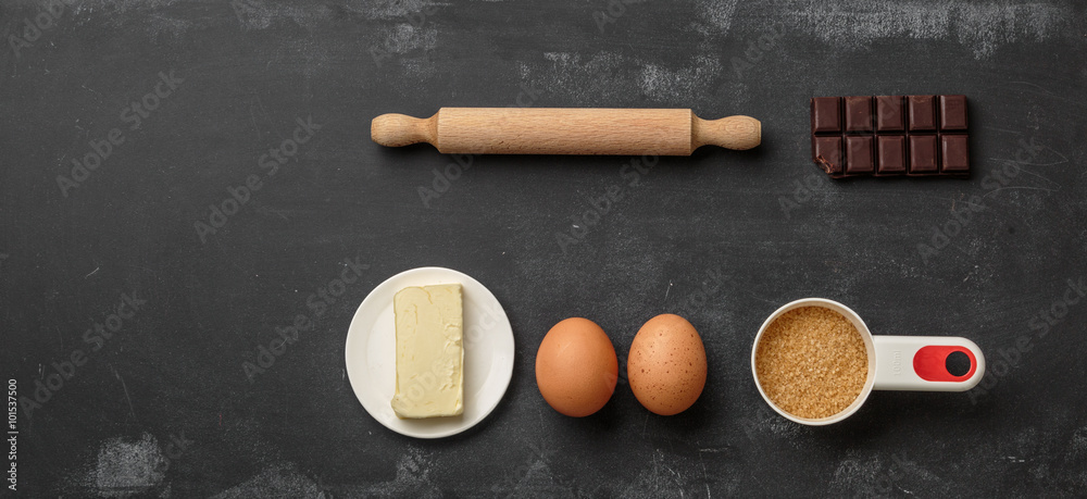 Top view of food ingredient on dark chalkboard with copy space for recipe Top view of food ingredient on dark chalkboard with copy space for recipe