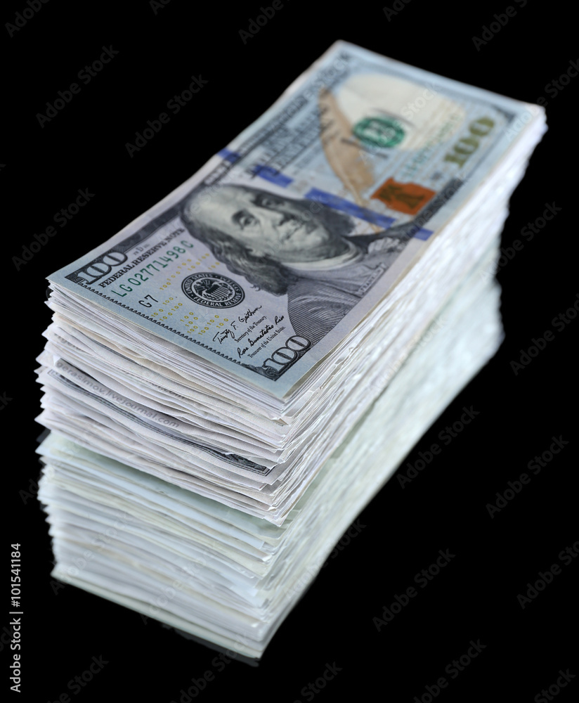 Stack of dollar banknotes on black background Stack of dollar banknotes on black background